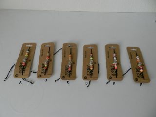 Obrázek z Náramek motýl, černá šňůrka, na kartě (12) 